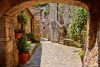 Vlies Fotótapéta - Arched Street in Tuscan - 375x250 cm