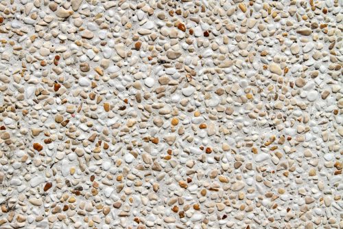 Vlies Fotótapéta - Gravel stone wall - 375x250 cm