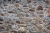 Vlies Fotótapéta - Stone wall of rough stones - 375x250 cm