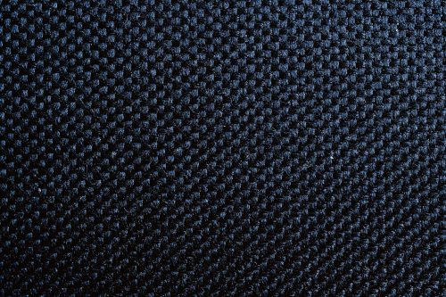 Vlies Fotótapéta - macro photo of black material - 375x250 cm