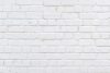 Vlies Fotótapéta - White wall of bricks - 375x250 cm