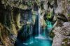 Vlies Fotótapéta - Waterfall in Soca mountain - 375x250 cm